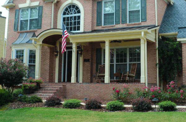 AFTER installation of arched roof half porch front yard view