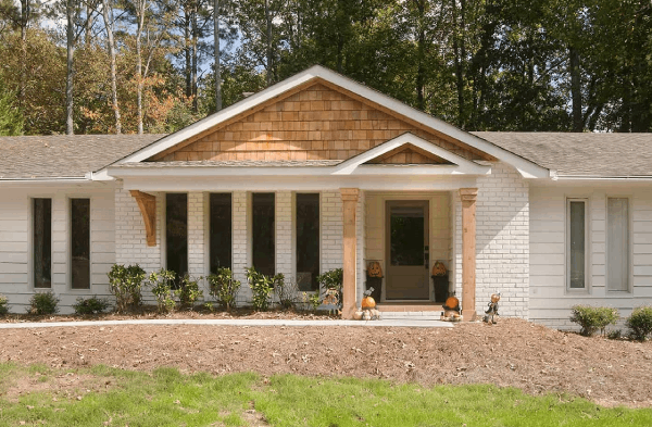 AFTER installation of gabled roof portico with with wooden columns on white brick rancher 2