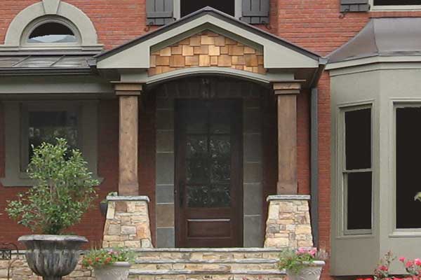 Cedar shake with stone bases steps for front porch