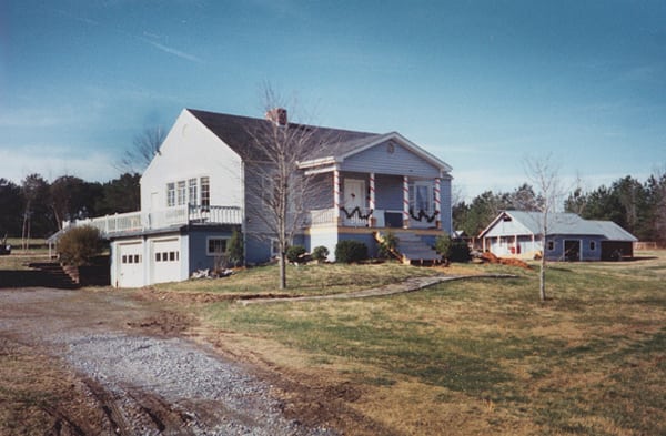 BEFORE installation of traditional front porch far away front lawn view of home