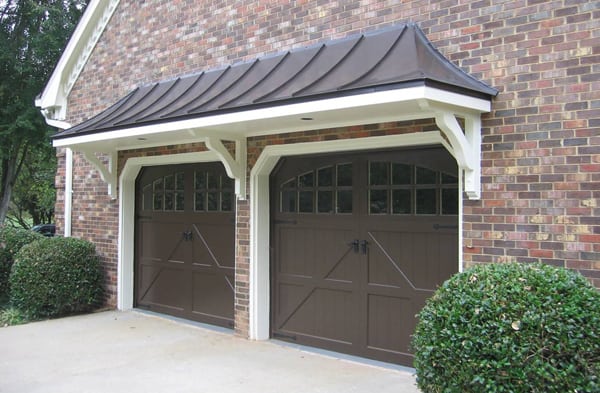 garage arbor and portico AFTER brick house two car brown garage doors 3