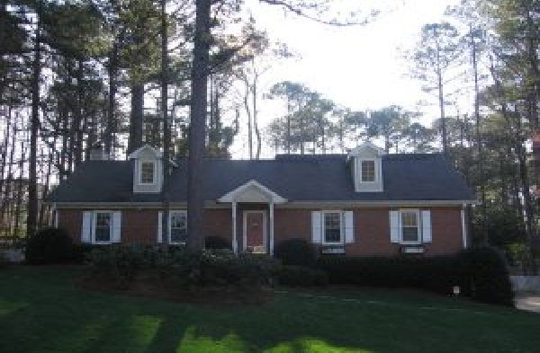 AFTER gabled roof portico installation with stone steps