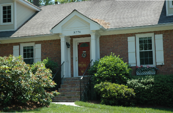 AFTER gabled roof portico installation with stone steps