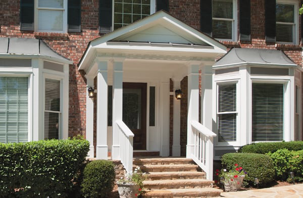 AFTER installation of gabled roof portico on stone porch