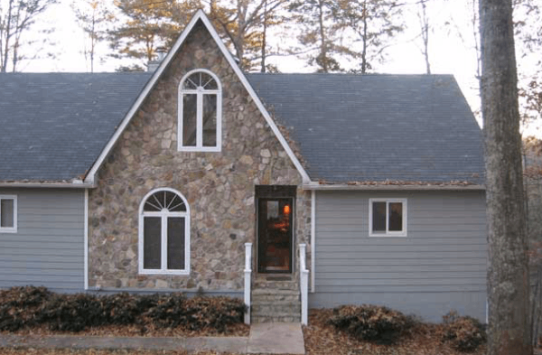 BEFORE installation of stone front porch with white columns and stone bases 2