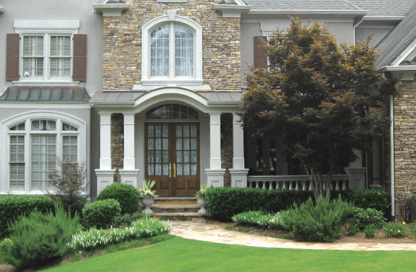 AFTER front porch with thick square white columns and double wooden door 2