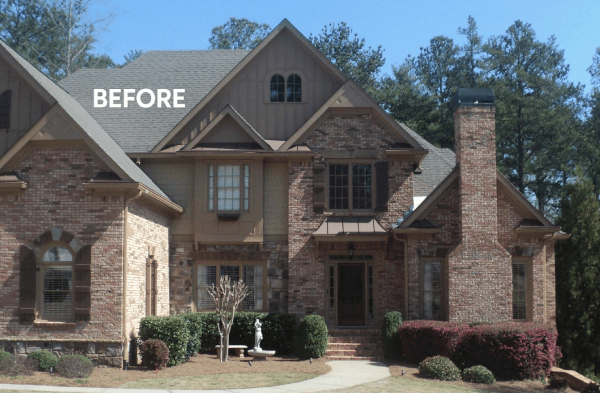 BEFORE installation of portico on large multi-colored brick home