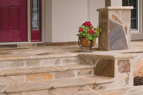 stone steps and base of front porch