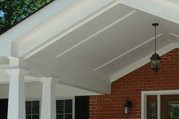 Tapered supports and gable roof portico