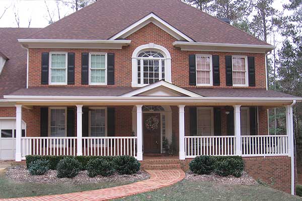 AFTER installation of traditional front porch on square brick home