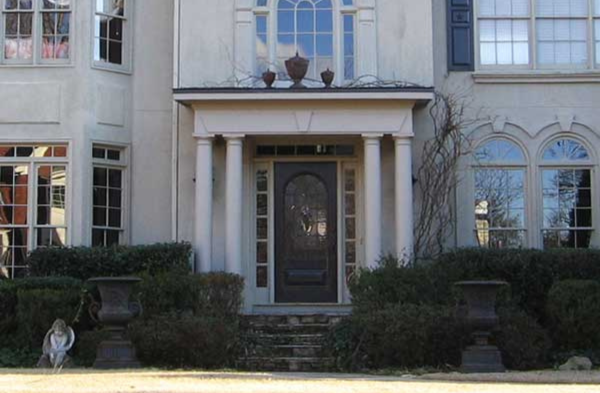 beige home brown door AFTER portico installation