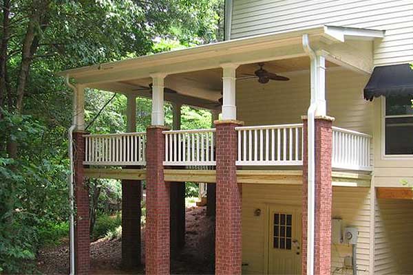 wraparound porch with brick columns