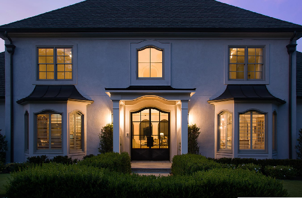 AFTER installation of hip roof portico (evening shot)