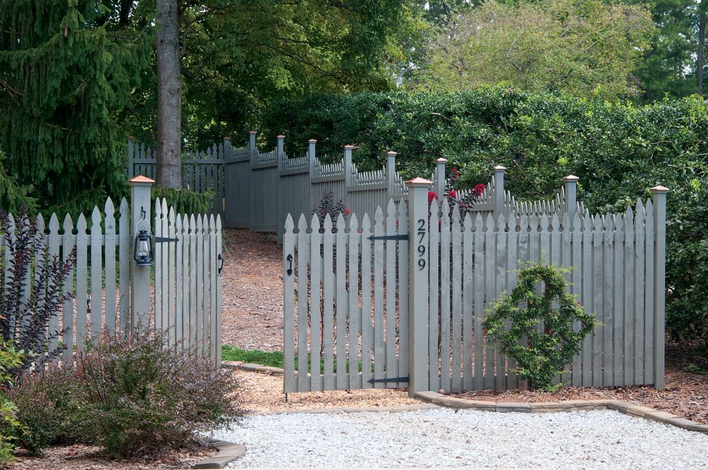 wooden picket fence with gate