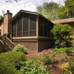 Hickory Flat, GA exterior view of screened back porch addition with Eze-Breeze windows