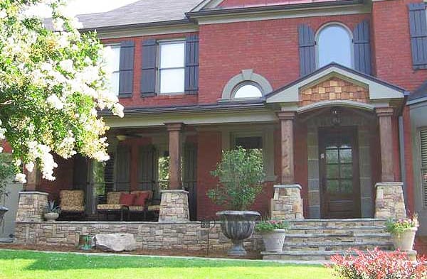 AFTER front porch installation on a craftsman tudor home