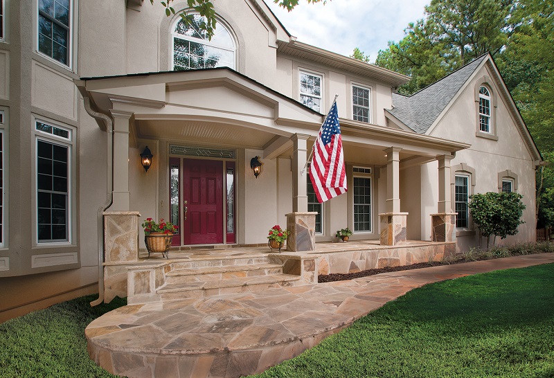 AFTER front porch on stone floor with american flag