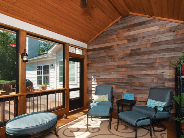 screened porch with wood wall and wood ceiling