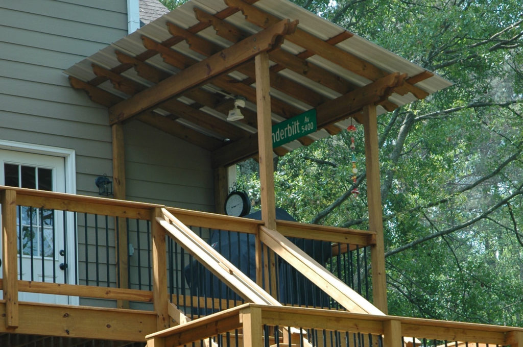 family-friendly expansive open porch with grill at top of stairs 2