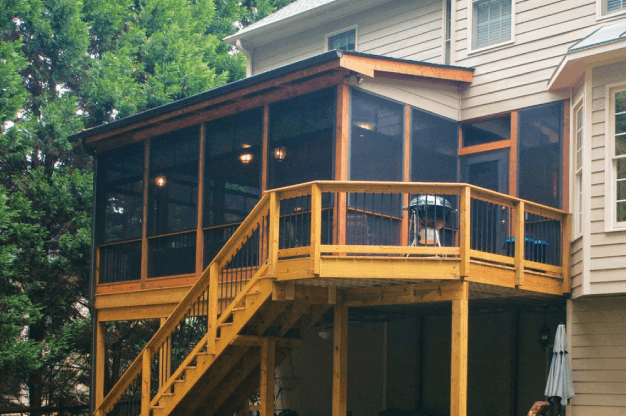 3 season screened porch orange cushions outside view