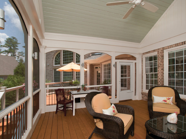 exterior back Screened Porch Conversion to Eze-Breeze® Porch next to deck with furniture