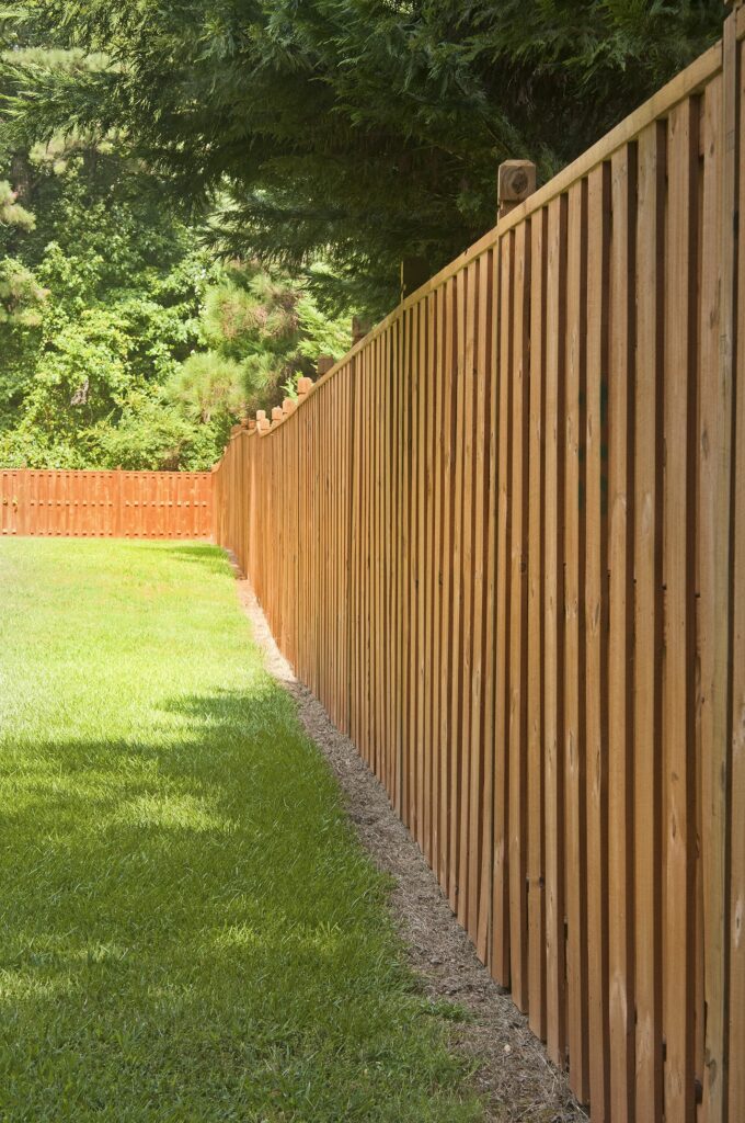 one long fenceline of privacy fence