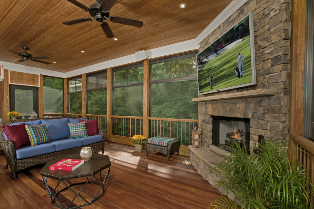 Eze-breeze porch with fireplace and tv