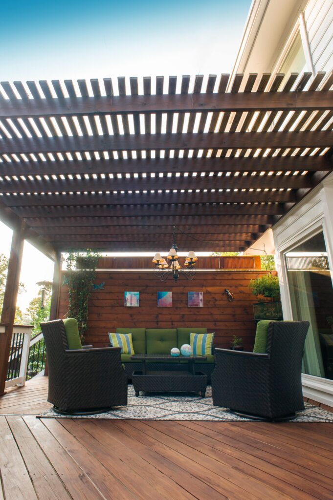 wooden pergola over wooden privacy wall full view