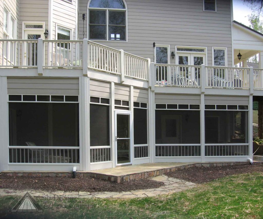 screened porch under white deck with white paneling