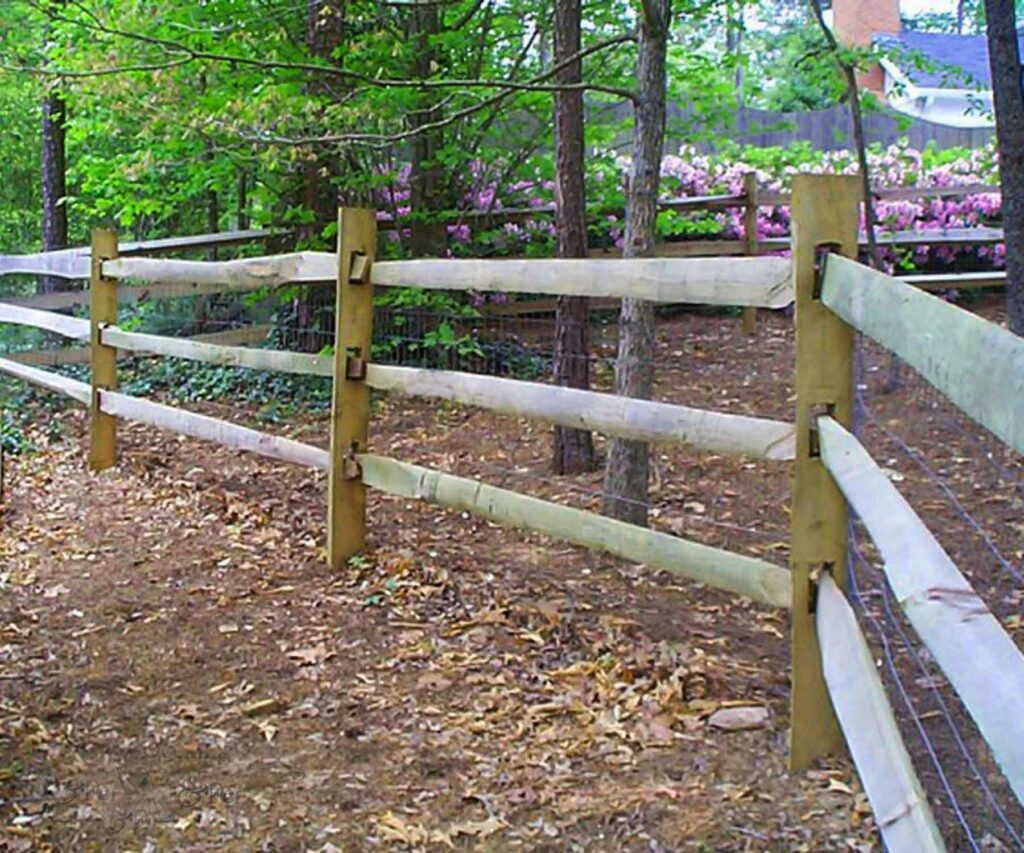 wooden split rail fence side corner view