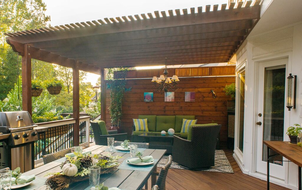 wooden pergola over wooden privacy wall