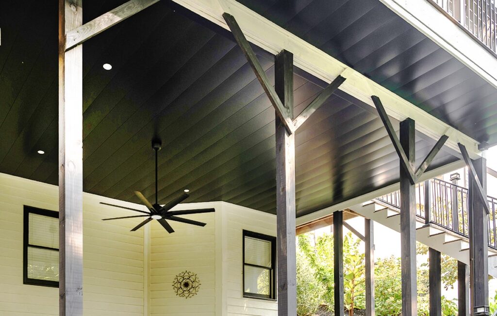 under deck black ceiling with fan close up