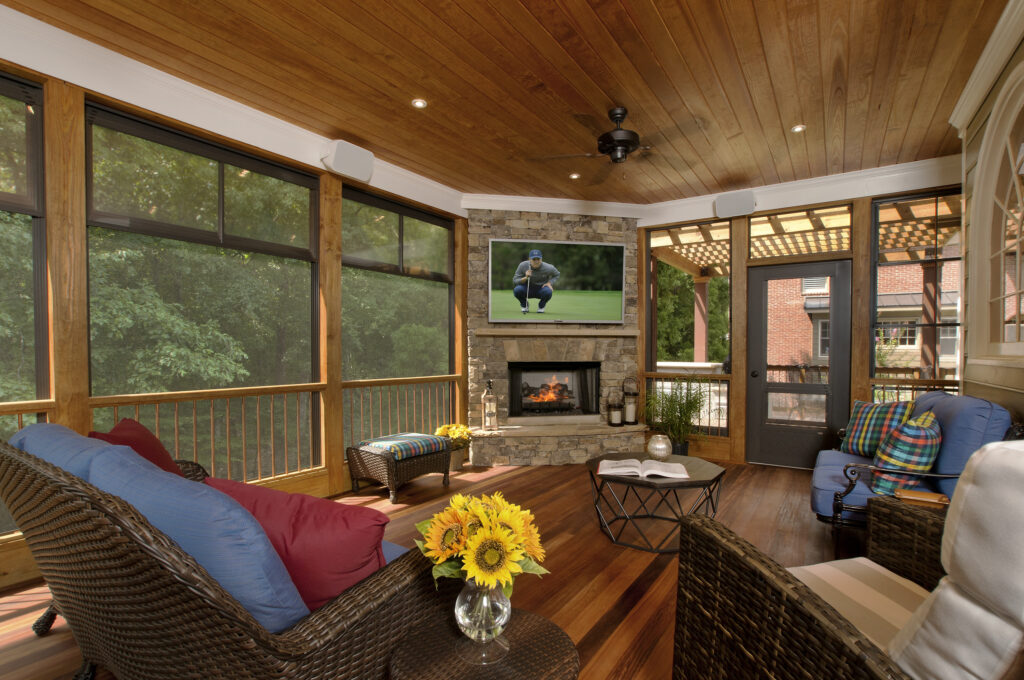 Eze-breeze porch with fireplace and tv 2