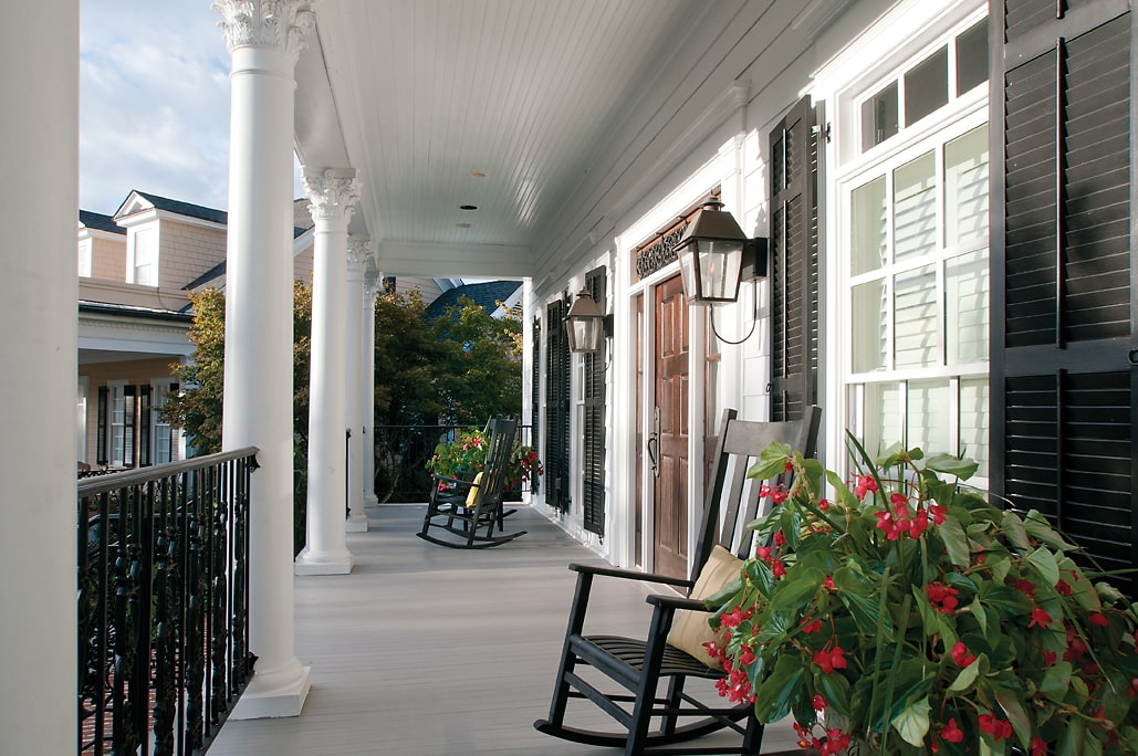 southern-style porch details from center right wih rocking chairs