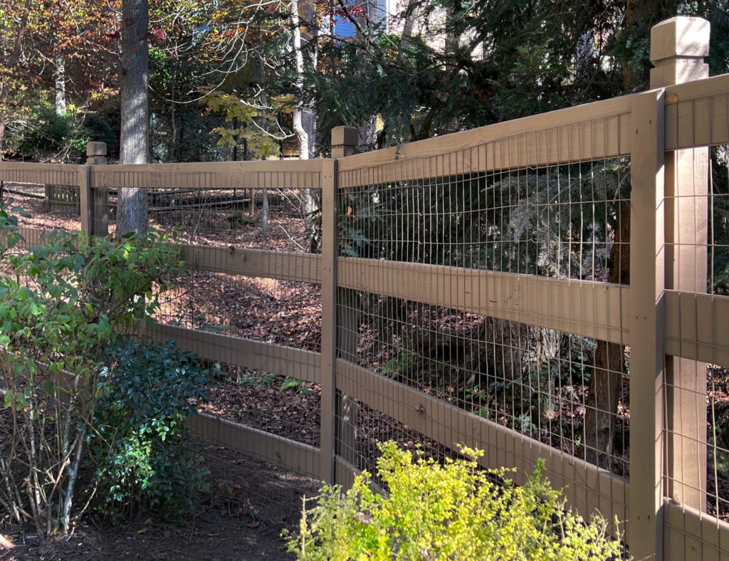 Cumming, GA wood fence 4 rail with wire